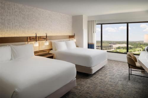 Postel nebo postele na pokoji v ubytování Hyatt Regency Austin