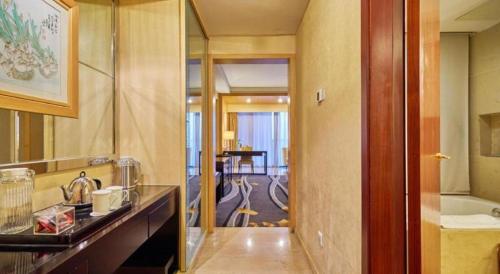Χώρος καθιστικού στο Huangshan Xuanyuan International Hotel