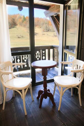 Χώρος καθιστικού στο Pastel Chalet