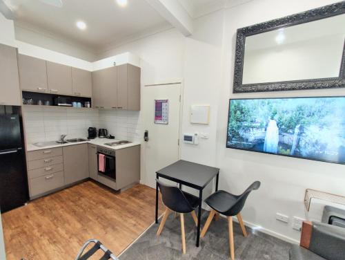 Η κουζίνα ή μικρή κουζίνα στο Grosvenor 3121 Richmond