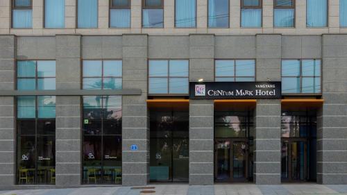a building with a sign that reads citizen mars hotel at Centum Mark Kimstay Yangyang in Yangyang