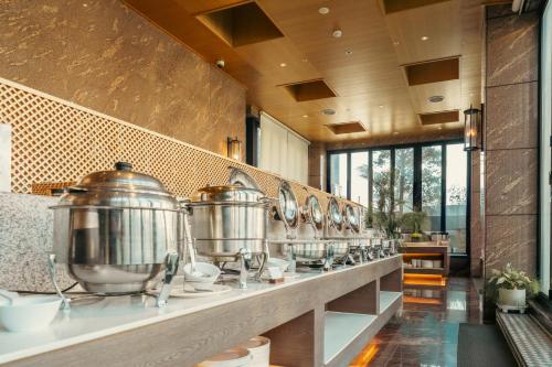 Una cocina o zona de cocina en Arban Hotel