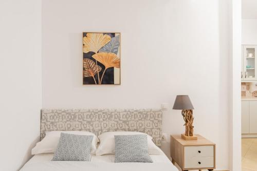 Ένα ή περισσότερα κρεβάτια σε δωμάτιο στο Chora Sea View Residence