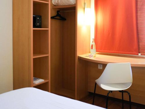 Un ou plusieurs lits dans un hébergement de l'établissement Ibis Tunis