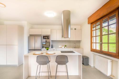 Η κουζίνα ή μικρή κουζίνα στο Espectacular chalet de montaña en plena naturaleza