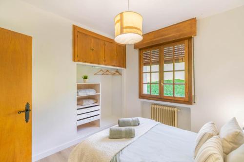 Ένα ή περισσότερα κρεβάτια σε δωμάτιο στο Espectacular chalet de montaña en plena naturaleza