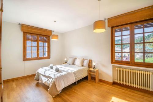 Ένα ή περισσότερα κρεβάτια σε δωμάτιο στο Espectacular chalet de montaña en plena naturaleza