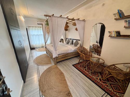 a bedroom with a bed and a swing at NATURE EMBRACE NEAR GANGEs in Rishīkesh