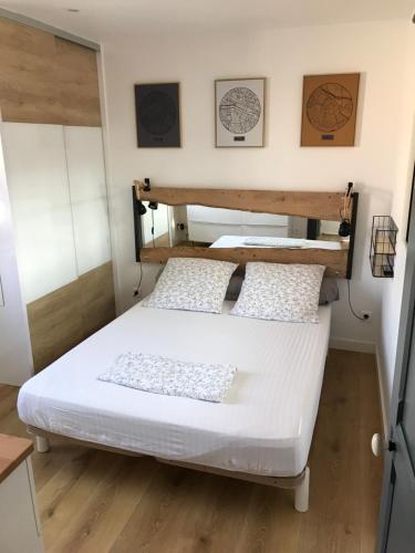 Cama o camas de una habitación en LE FARNIENTE AU BORD DE MER