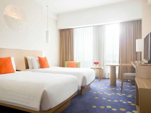 Letto o letti in una camera di Novotel Bandung