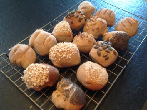 a rack of donuts sitting on top of a table at The Factor's House in Cromarty