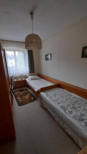 Postel nebo postele na pokoji v ubytování Haus Barnabas im Engel, Gasthaus Engel