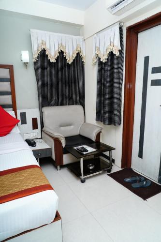 Ένα ή περισσότερα κρεβάτια σε δωμάτιο στο Hotel Mar Kalupur