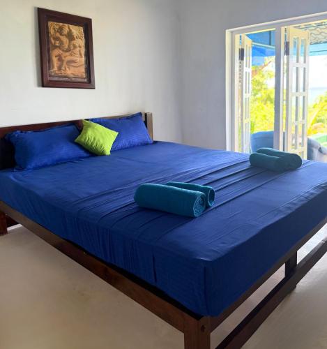 Postel nebo postele na pokoji v ubytování Shore Beach Villa
