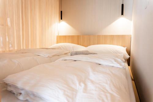 Postel nebo postele na pokoji v ubytování Design Apartment Bad Aussee