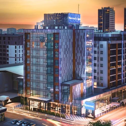 a rendering of a tall building with lights on at Sia Hotel Thermal & Spa in Nilüfer