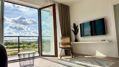 Μια τηλεόραση ή/και κέντρο ψυχαγωγίας στο TIMELESS Apartment