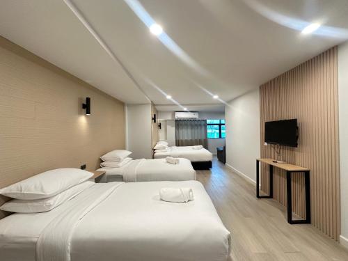 Ένα ή περισσότερα κρεβάτια σε δωμάτιο στο EbS Residence Chaweng