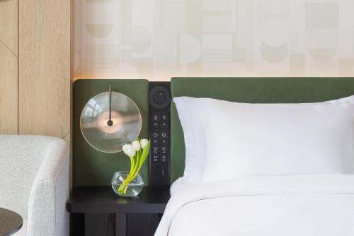Ein Bett oder Betten in einem Zimmer der Unterkunft EVEN Hotel Hangzhou West Lake by IHG