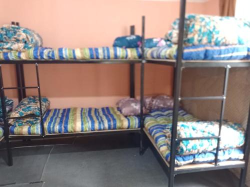 Postel nebo postele na pokoji v ubytování BPR Hostel