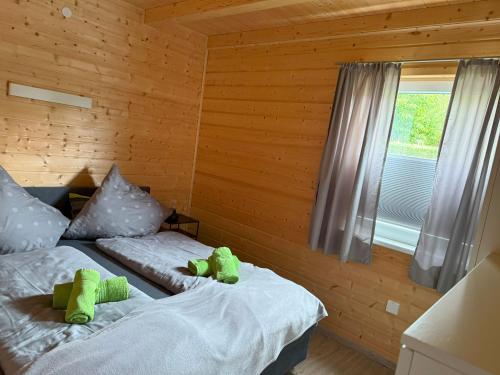 Katil atau katil-katil dalam bilik di Ferienhaus Vogelnest