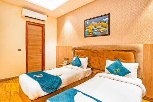 Ένα ή περισσότερα κρεβάτια σε δωμάτιο στο The Riverstone Inn