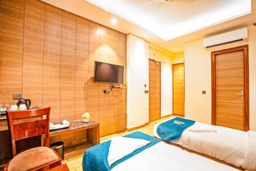 Ένα ή περισσότερα κρεβάτια σε δωμάτιο στο The Riverstone Inn
