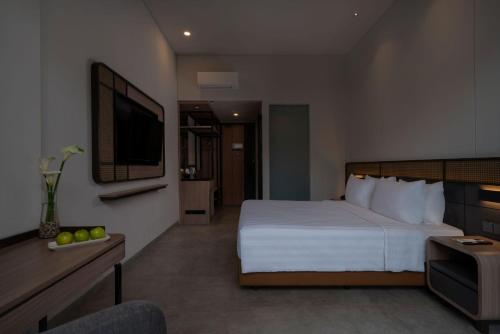 Postel nebo postele na pokoji v ubytování Laska Hotel & Resort Ciater