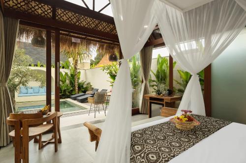 Πισίνα στο ή κοντά στο Changi Jungle Ubud Villas