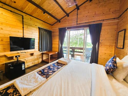 Postel nebo postele na pokoji v ubytování Seclude Eco Cottages