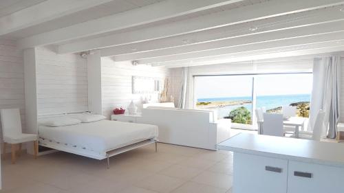 Casa Dansodà sul mareにあるベッド