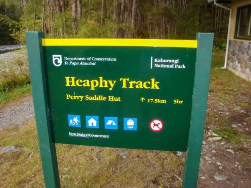 a sign for a happy trail in a park at The Station House Motel in Collingwood