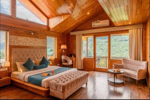 Un pat sau paturi într-o cameră la Alexandra Cottage