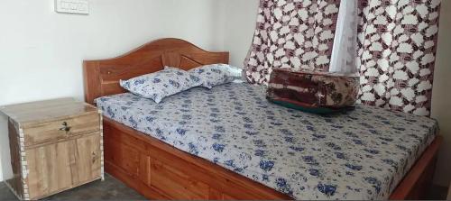 Postel nebo postele na pokoji v ubytování Kolkatawala Homestay and Restaurant