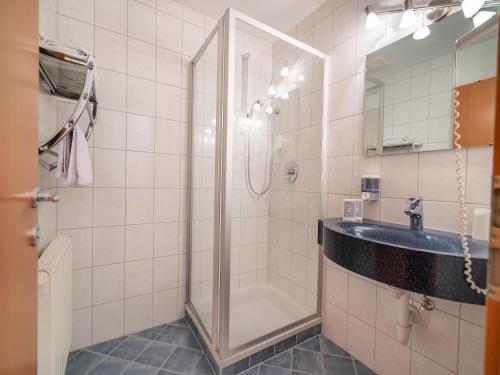 a bathroom with a shower and a sink at Apartment in Neustift in a quiet location in Neustift im Stubaital