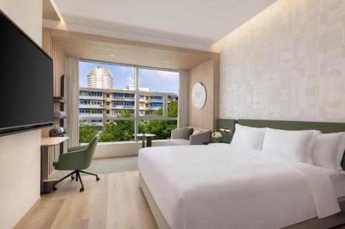 Ein Bett oder Betten in einem Zimmer der Unterkunft EVEN Hotel Hangzhou West Lake by IHG
