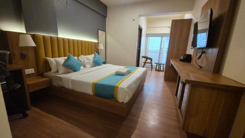 Postel nebo postele na pokoji v ubytování Hotel Vaari Vista