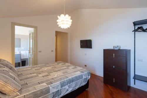 Postel nebo postele na pokoji v ubytování Cava Ardè Rooms