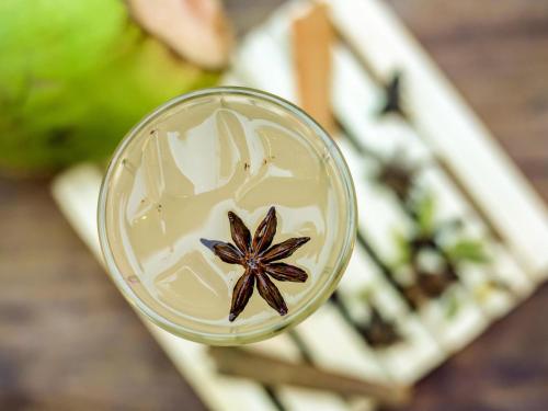 a close up of a glass of drink with a brown starstruckolateolate at ibis Bengaluru City Centre - An Accor Brand in Bengaluru