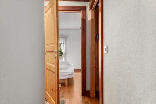 an open door to a room with a bed at KAL149-Fagerhult-Arhult-1-23 in Fagerhult