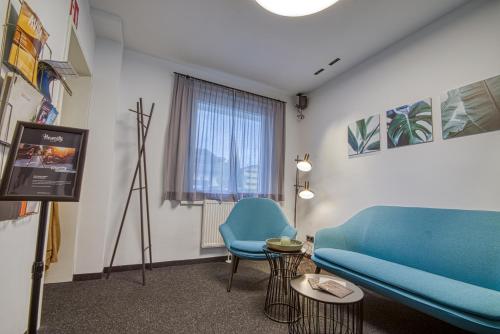 TV a/nebo společenská místnost v ubytování Lifestylehotel Das Max