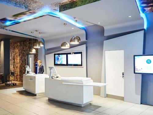 a room with blue lights on the ceiling at Novotel Liverpool Centre in Liverpool