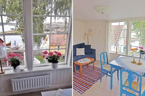 a living room with a table and chairs and windows at BOH668-Kloevedal-Bjoerholmen-81 in Björholmen