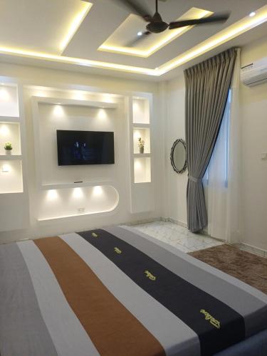 Postel nebo postele na pokoji v ubytování PK'S Luxury Apartments