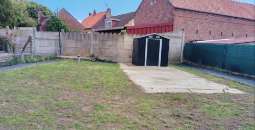 Ein Garten an der Unterkunft L'Echappée Quéantaise, Parking, Jardin, au calme