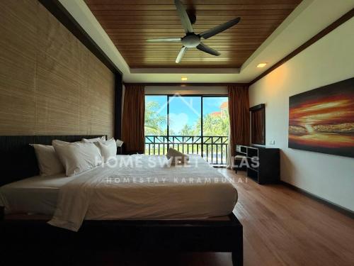 Cama o camas de una habitación en Home Sweet Villas, Karambunai