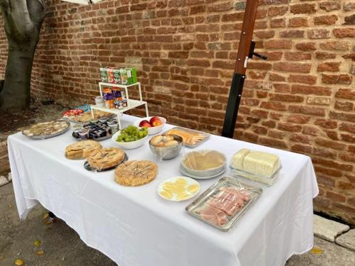 a white table with food on top of it at TENUTA BORGATO MORELLI in Este