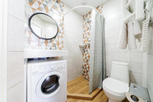 Ένα μπάνιο στο Апартаменти MYFREEDOM ЖК Місто Квітів поруч із метро Сирець