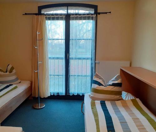 Postel nebo postele na pokoji v ubytování Herberge Zum Steiger Franz