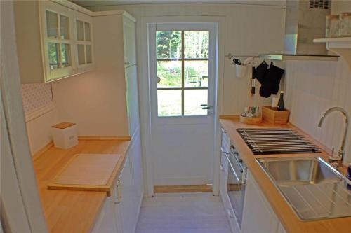 Una cocina o cocineta en KRO478-Lammhult-Aneboda-Kramphult-Sjoeakra